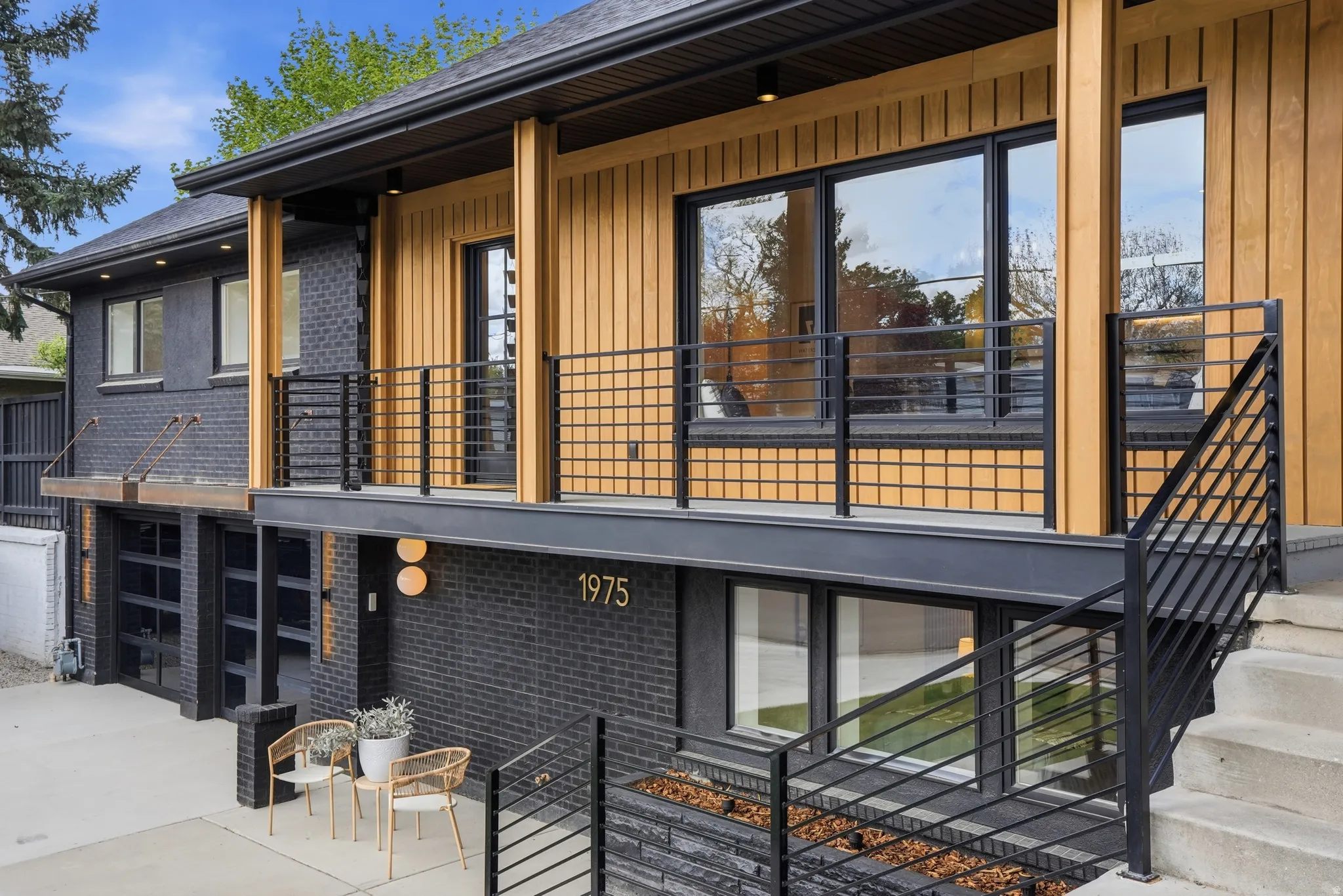 ELEVATED RAMBLER WITH 2-CAR GARAGE AND LARGE SIDE YARD