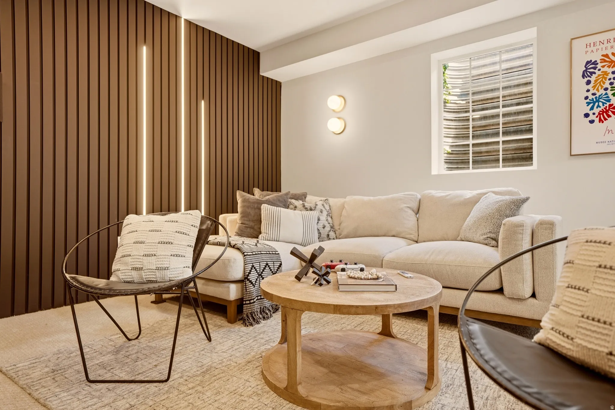 LOWER LEVEL MOVIE ROOM ADJACENT TO HOME GYM AND SMALL SAFE ROOM