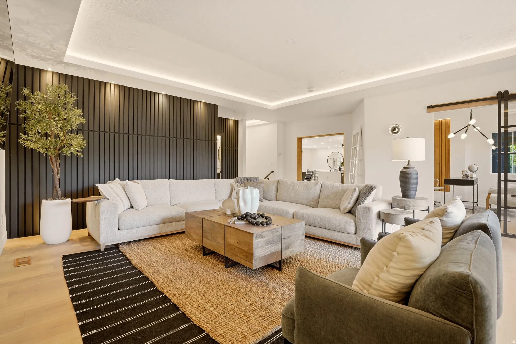 FAMILY ROOM WITH WINE ROOM AND EXPANSIVE FOLDING PATIO DOOR
