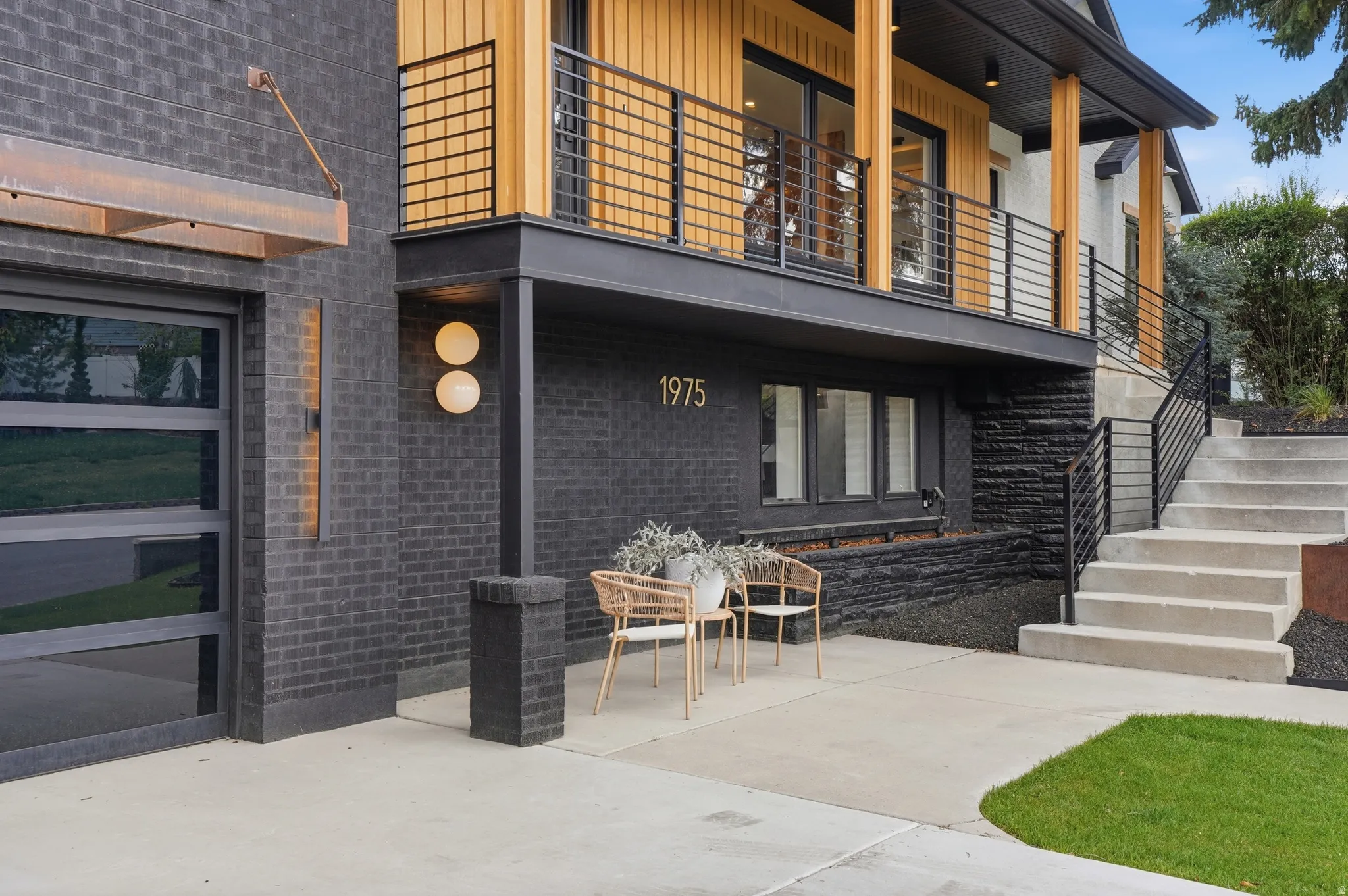 ELEVATED RAMBLER WITH 2-CAR GARAGE AND LARGE SIDE YARD