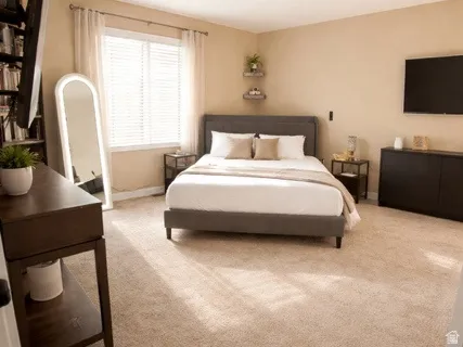 Bedroom featuring carpet flooring
