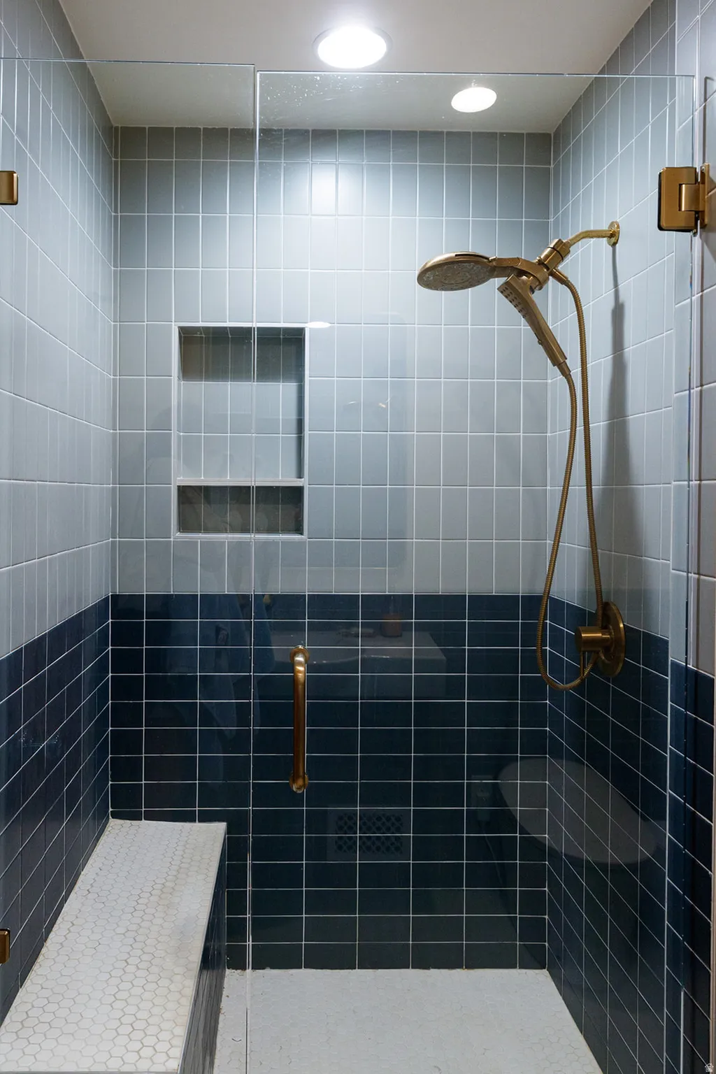 Full bathroom with a shower stall and recessed lighting