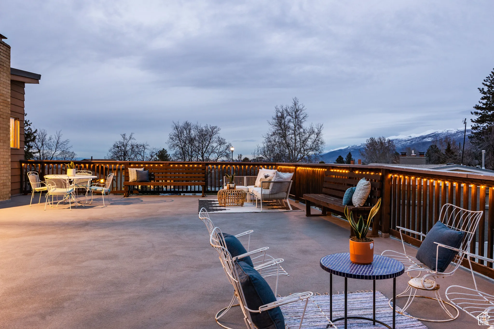 View of patio featuring an outdoor living space and a mountain view