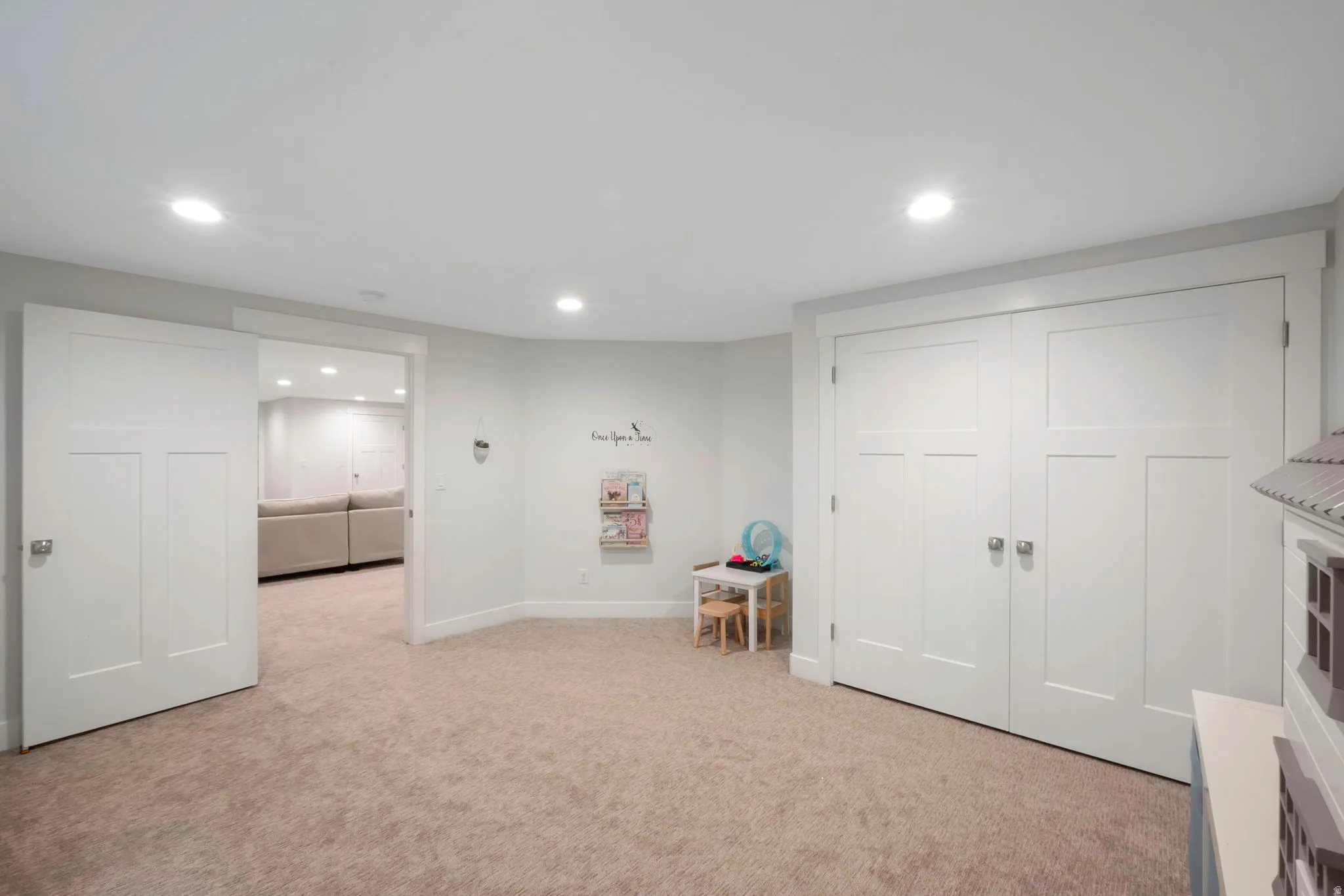 Playroom featuring light carpet and recessed lighting
