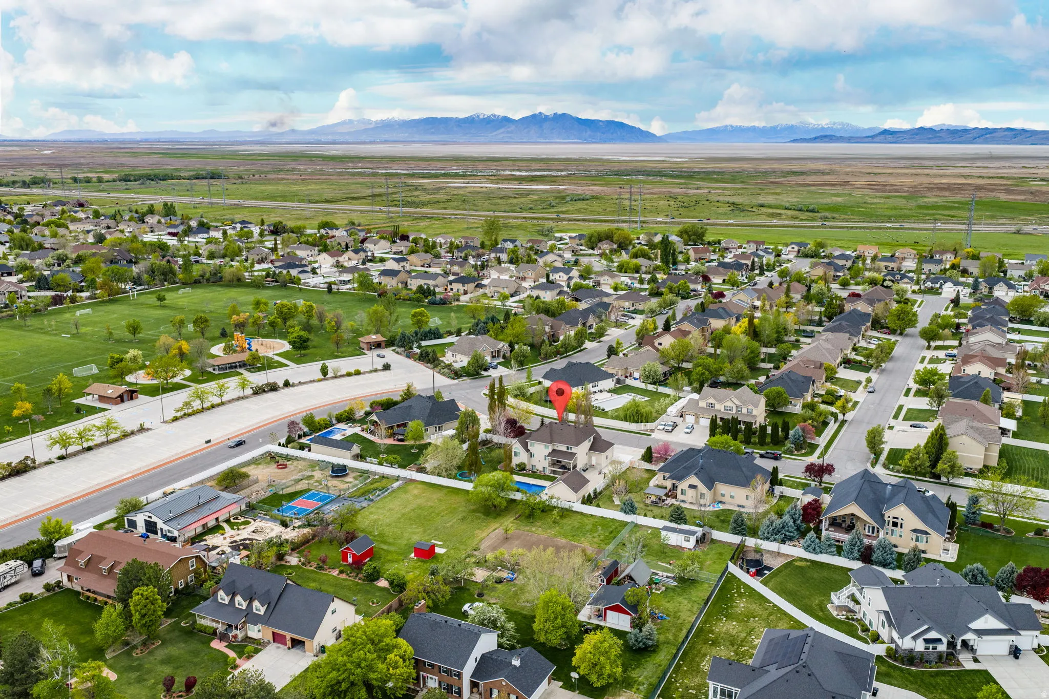 Aerial view of residential area with a mountainous background