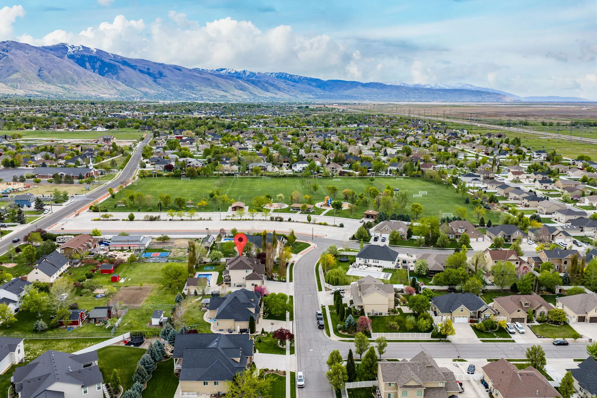 Aerial perspective of suburban area with mountains
