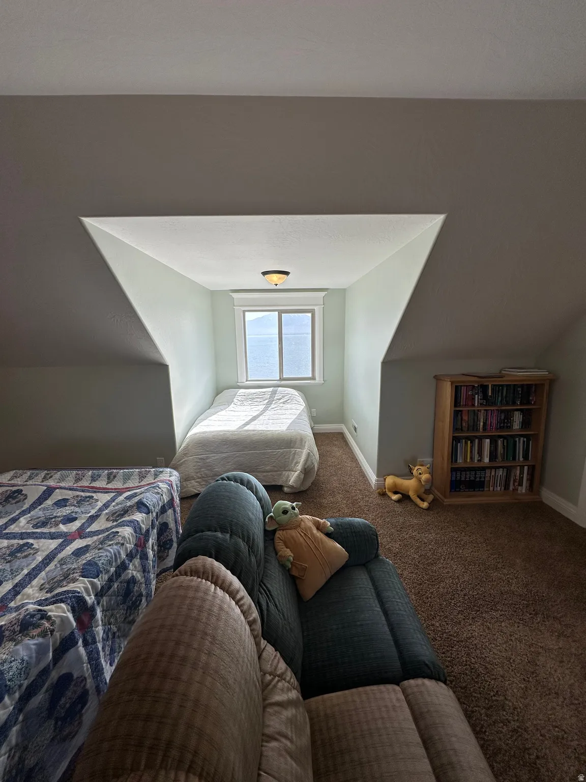 Bedroom with carpet and baseboards