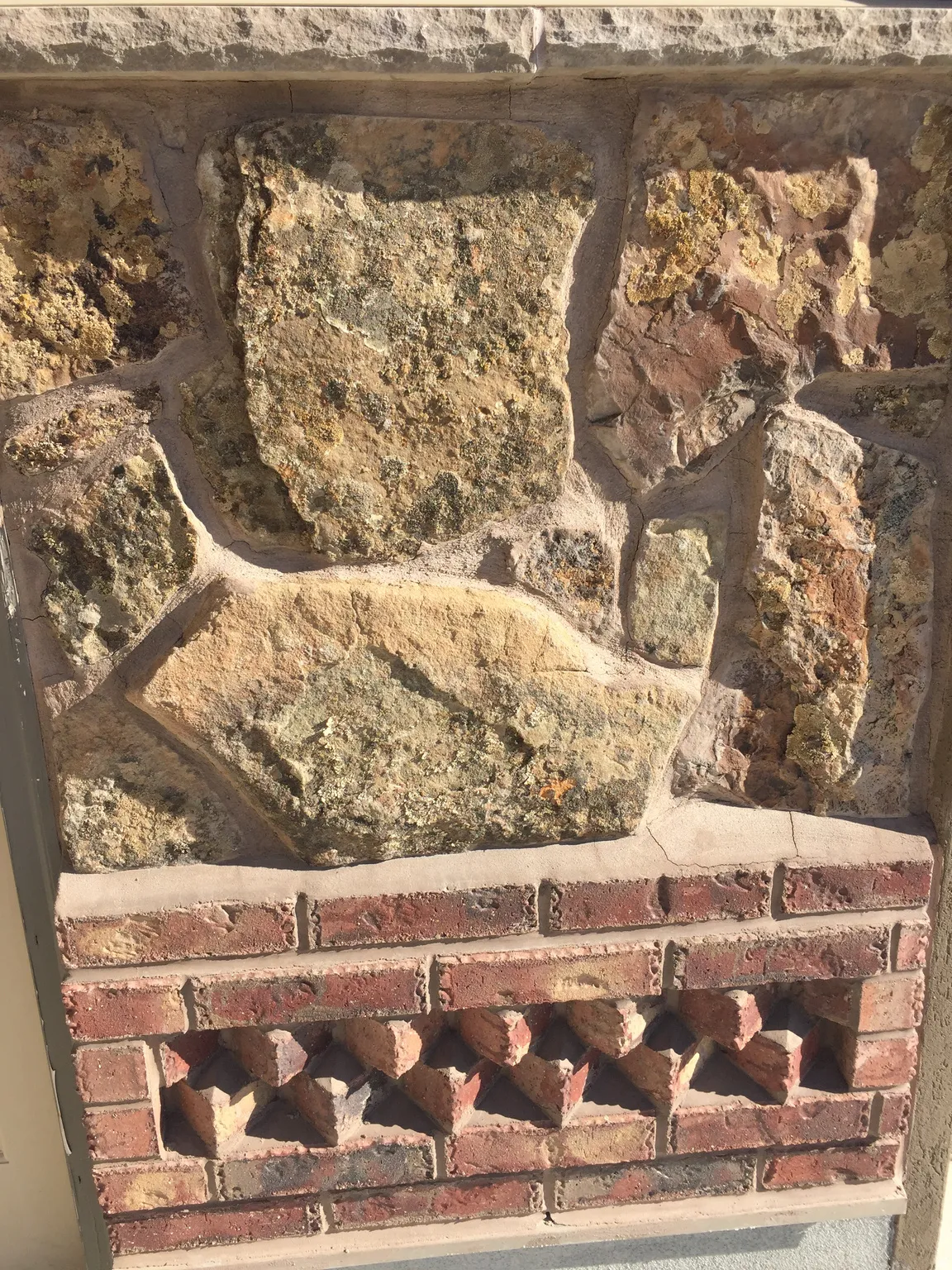 Exterior view of brick siding and stone siding