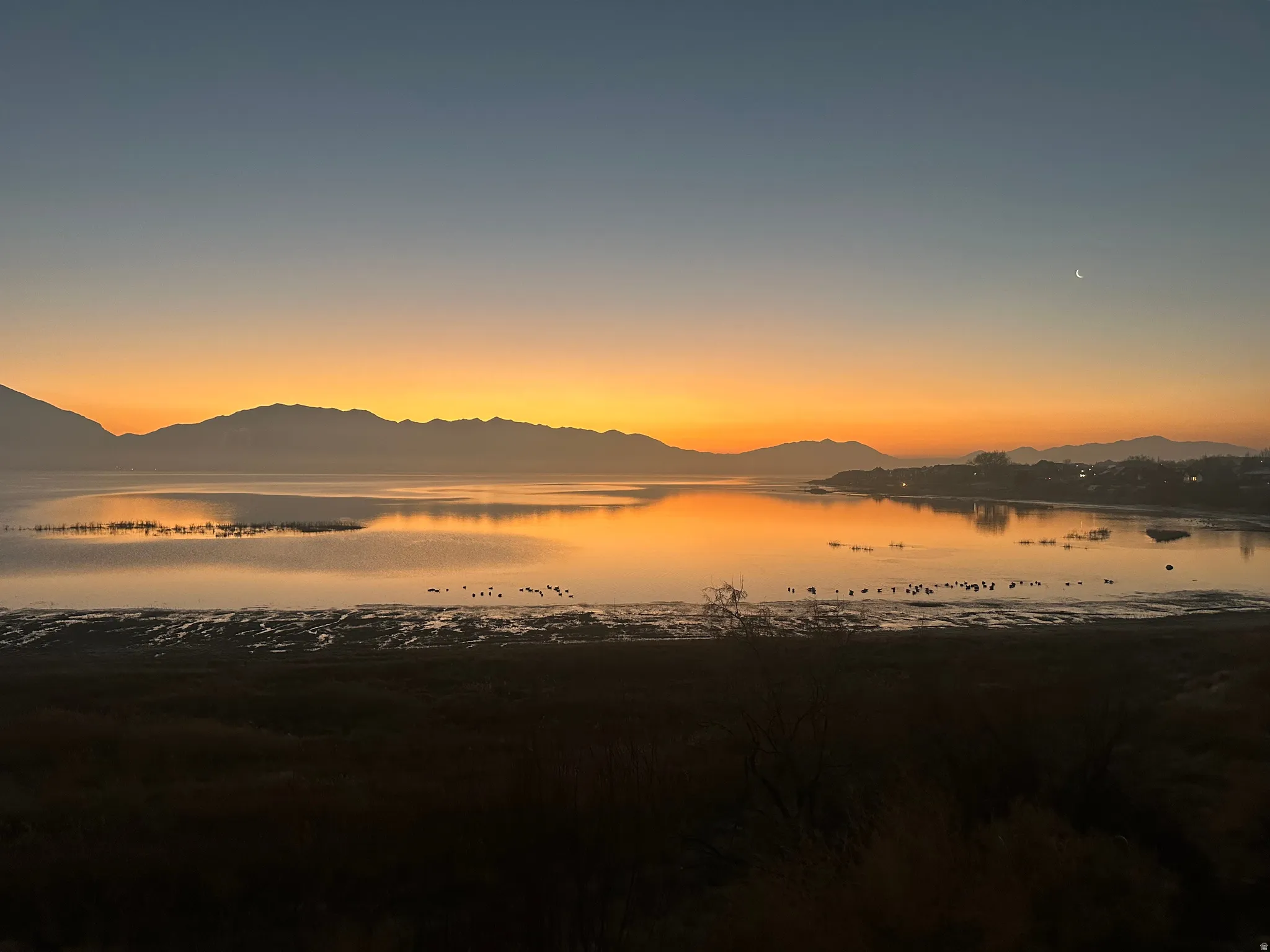 View of mountain background with a large body of water