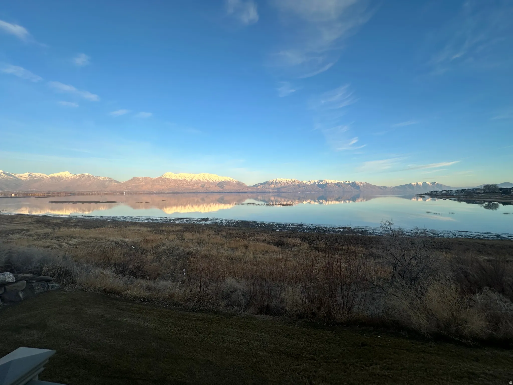 View of mountain background featuring a nearby body of water