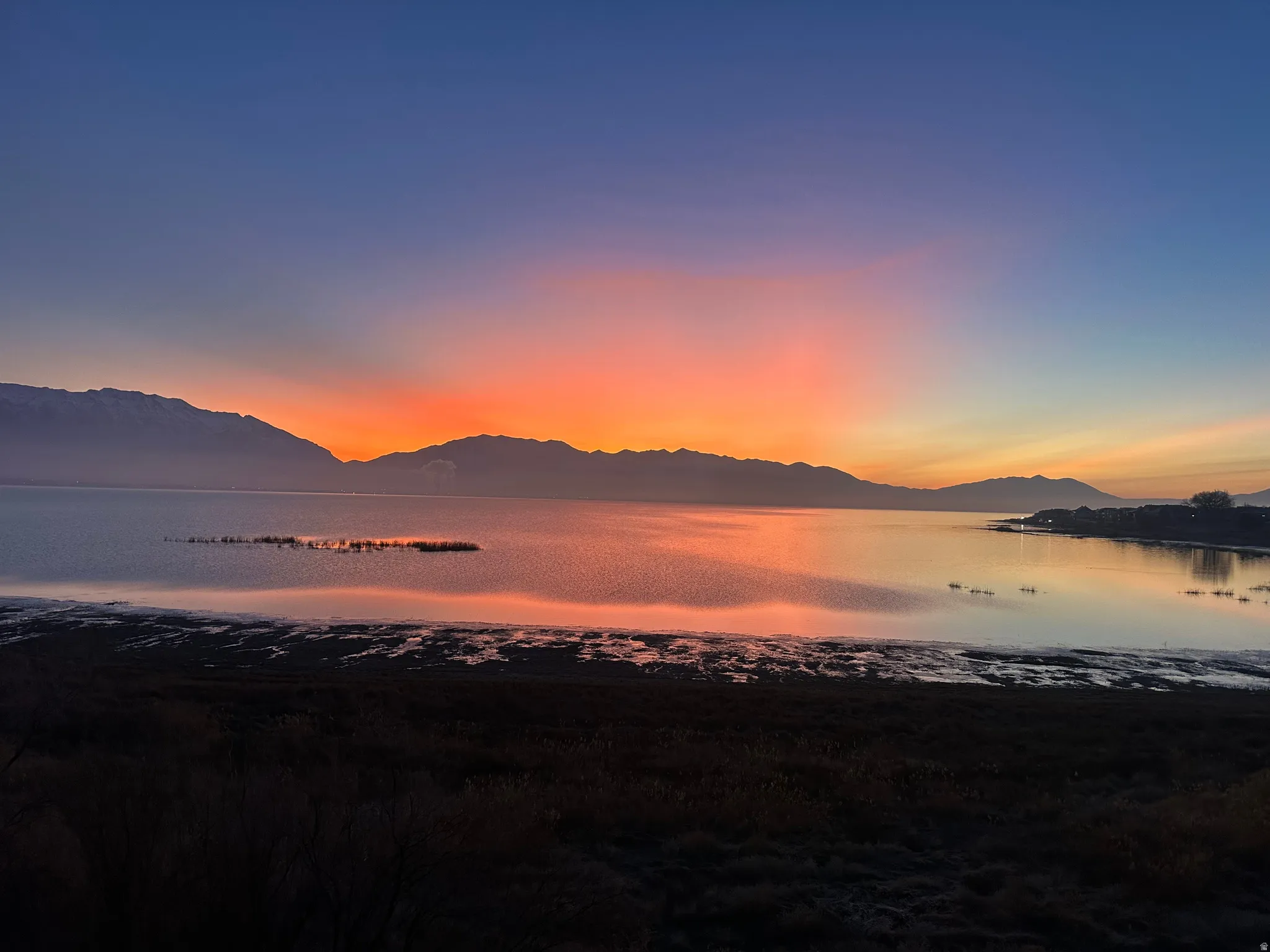 Mountain view featuring a large body of water