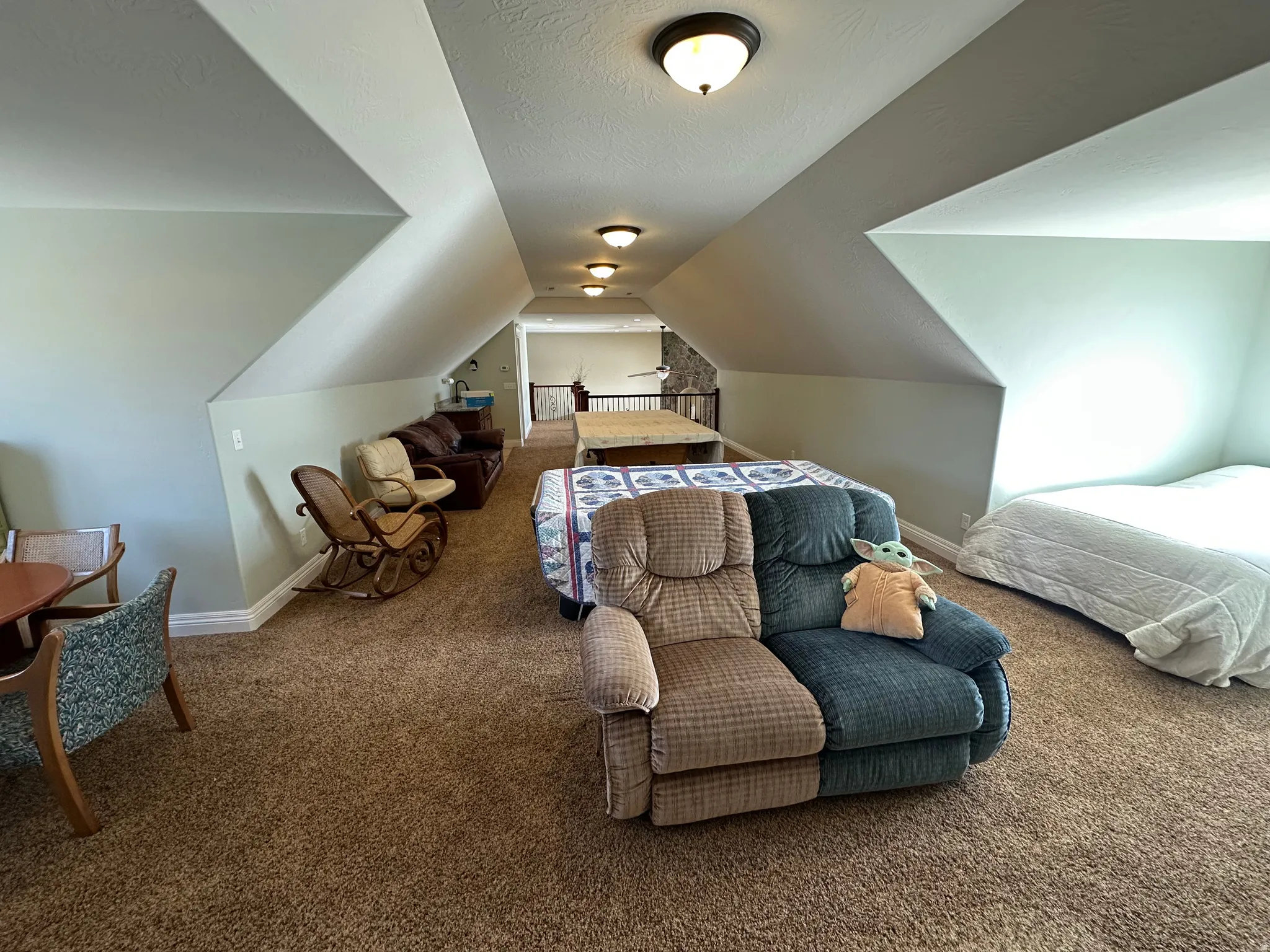 Bedroom with baseboards and carpet flooring