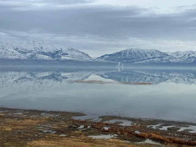 Mountain view featuring a large body of water