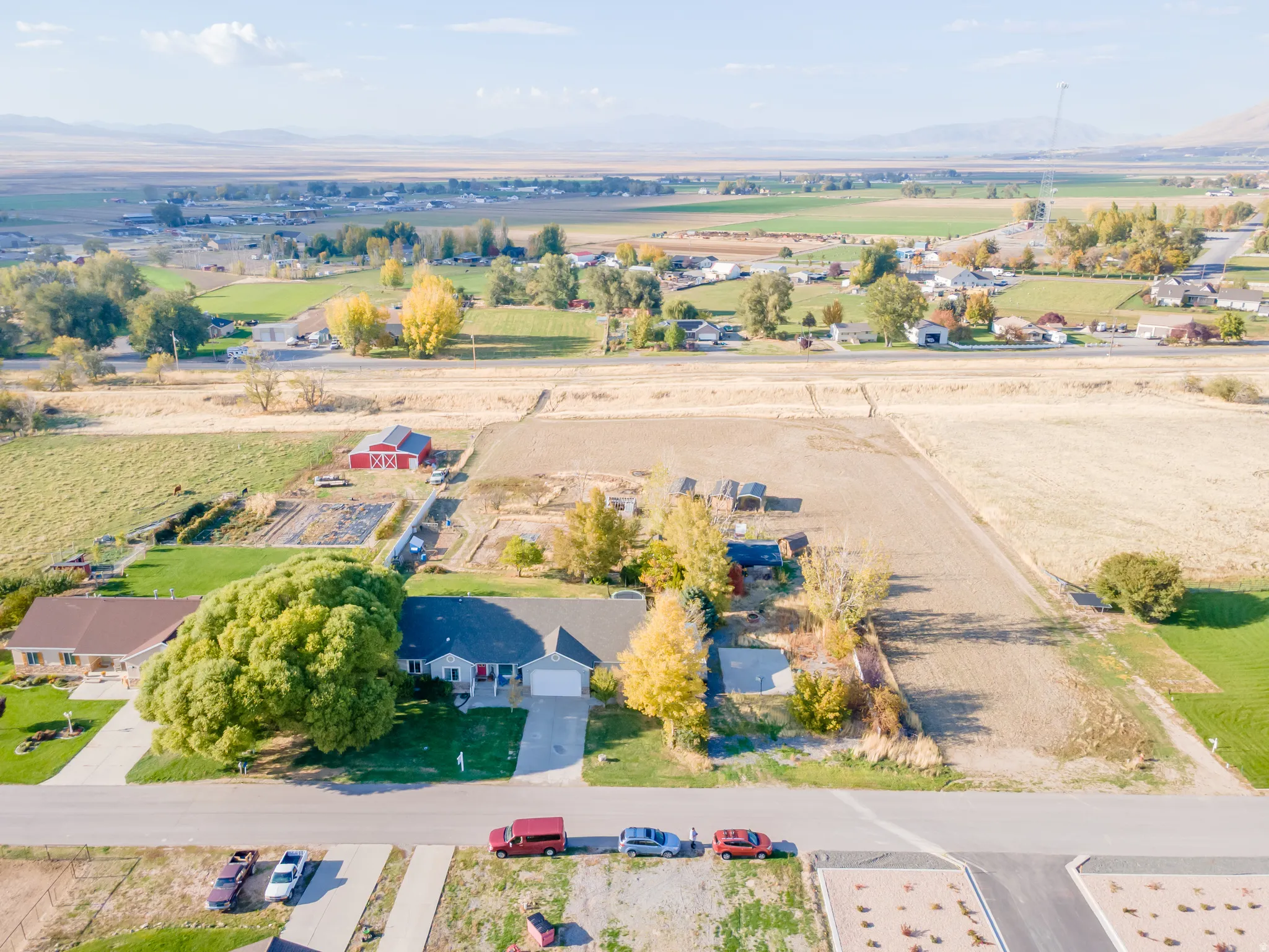 Overview of rural landscape featuring a mountainous background