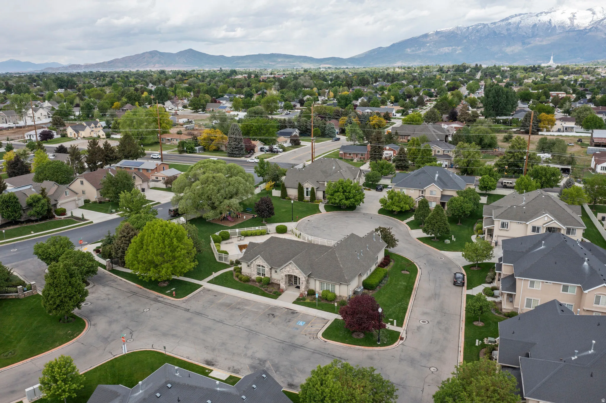 Aerial view of residential area featuring mountains