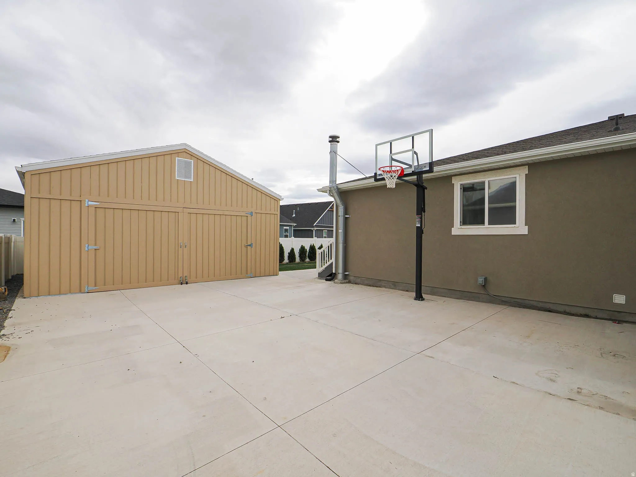 View of patio / terrace with an outbuilding