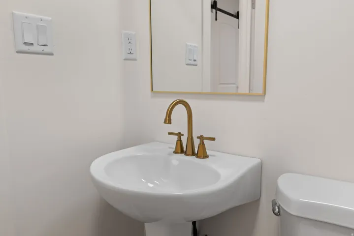 Bathroom featuring toilet and a sink
