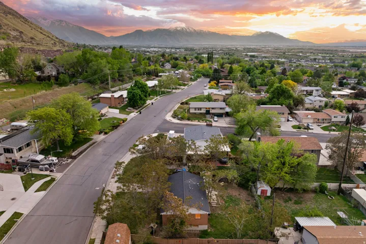 Aerial view at dusk of a mountain view and a residential view