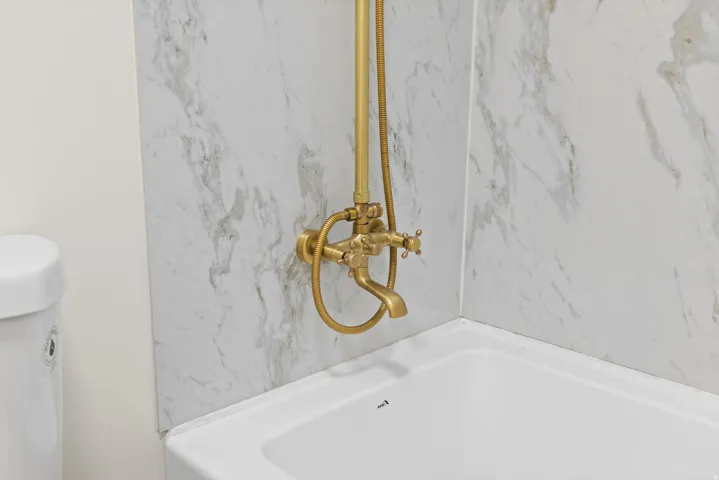 Full bathroom featuring toilet and shower / tub combination