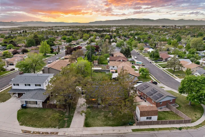Aerial view at dusk of a mountain view and a residential view