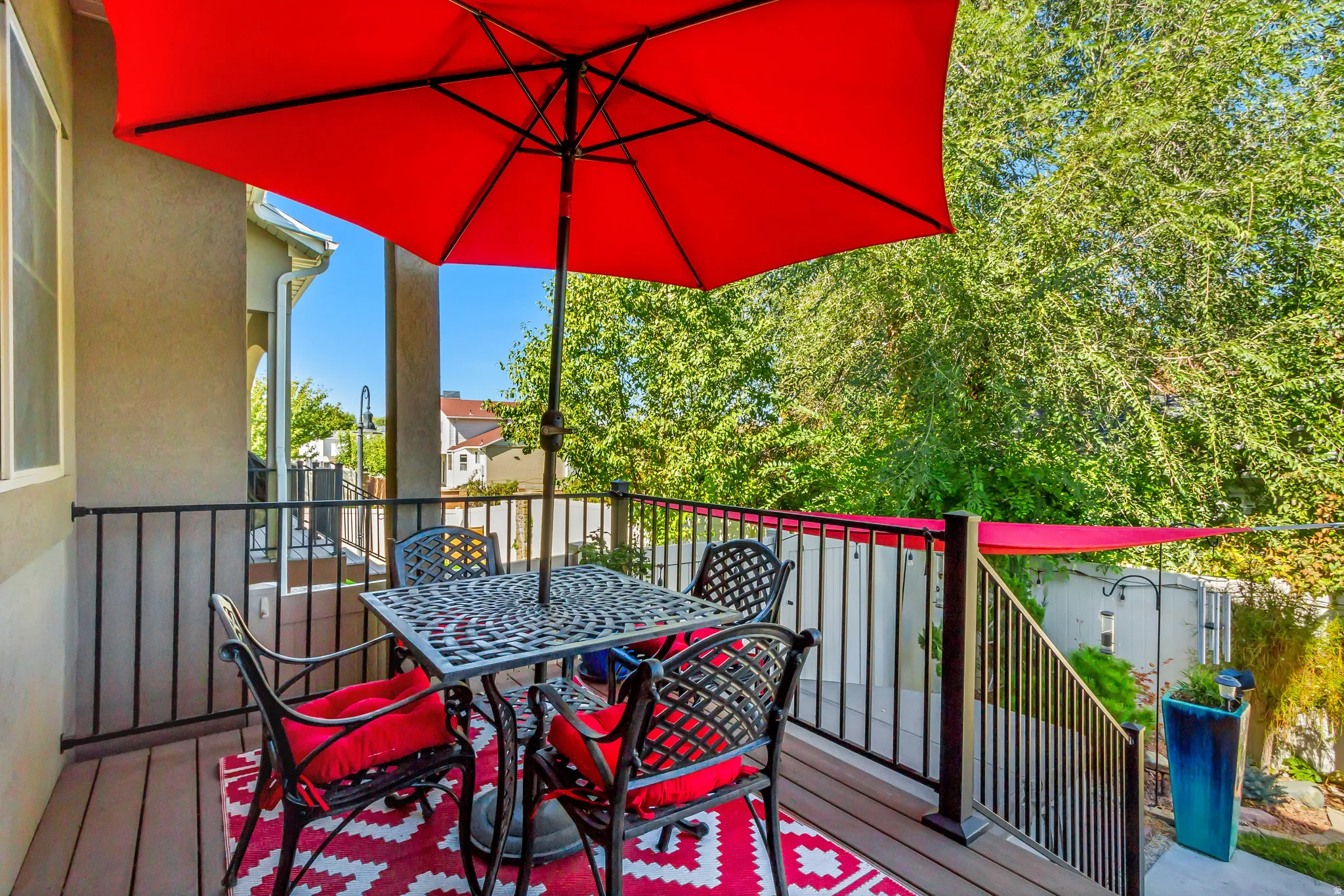 Wooden terrace featuring outdoor dining area