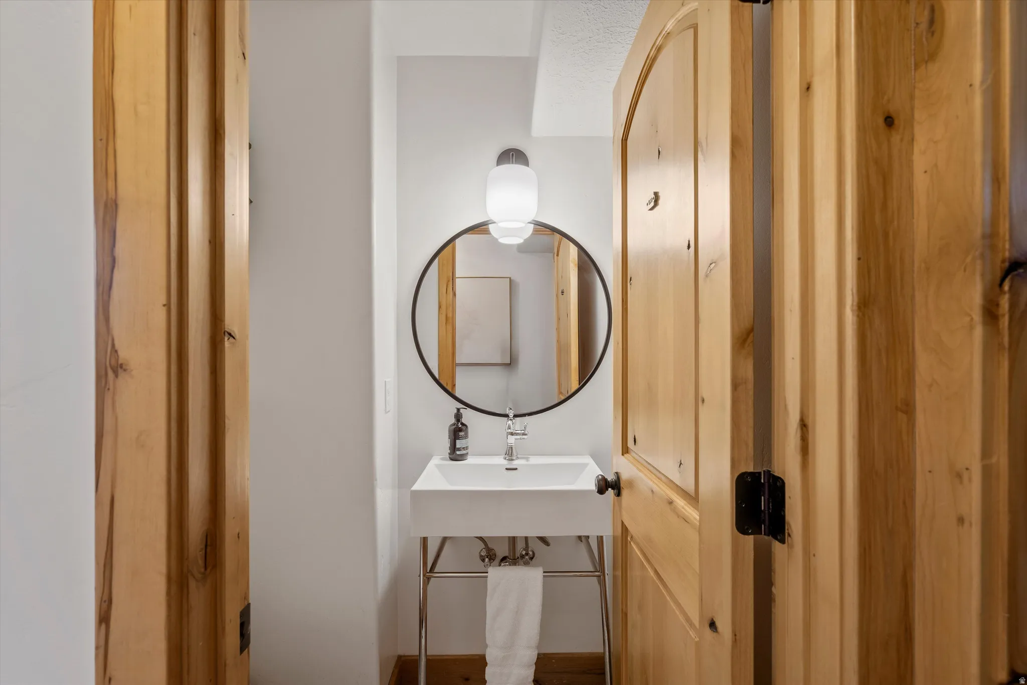 Half bathroom with a sink