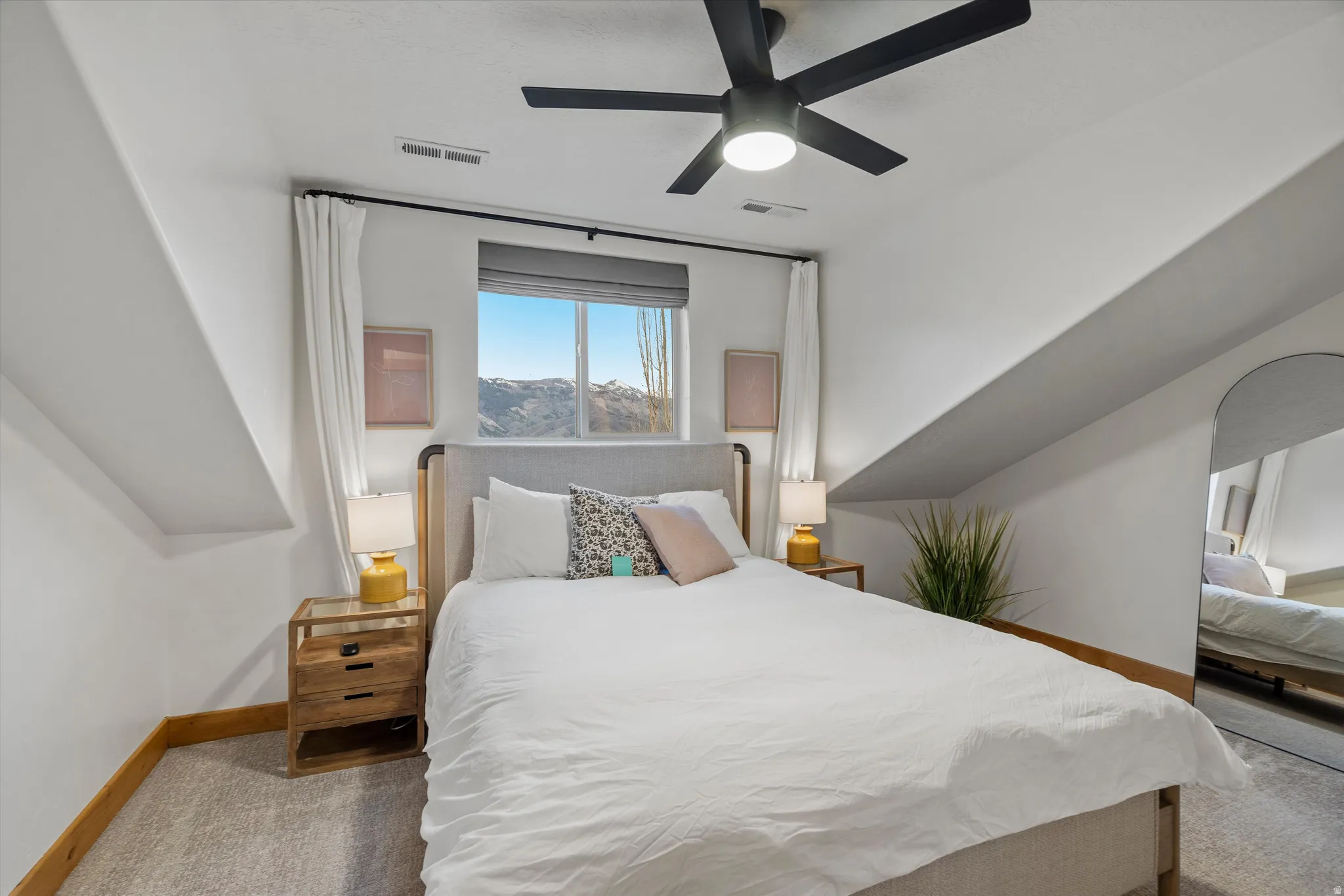 Bedroom featuring carpet flooring and a ceiling fan