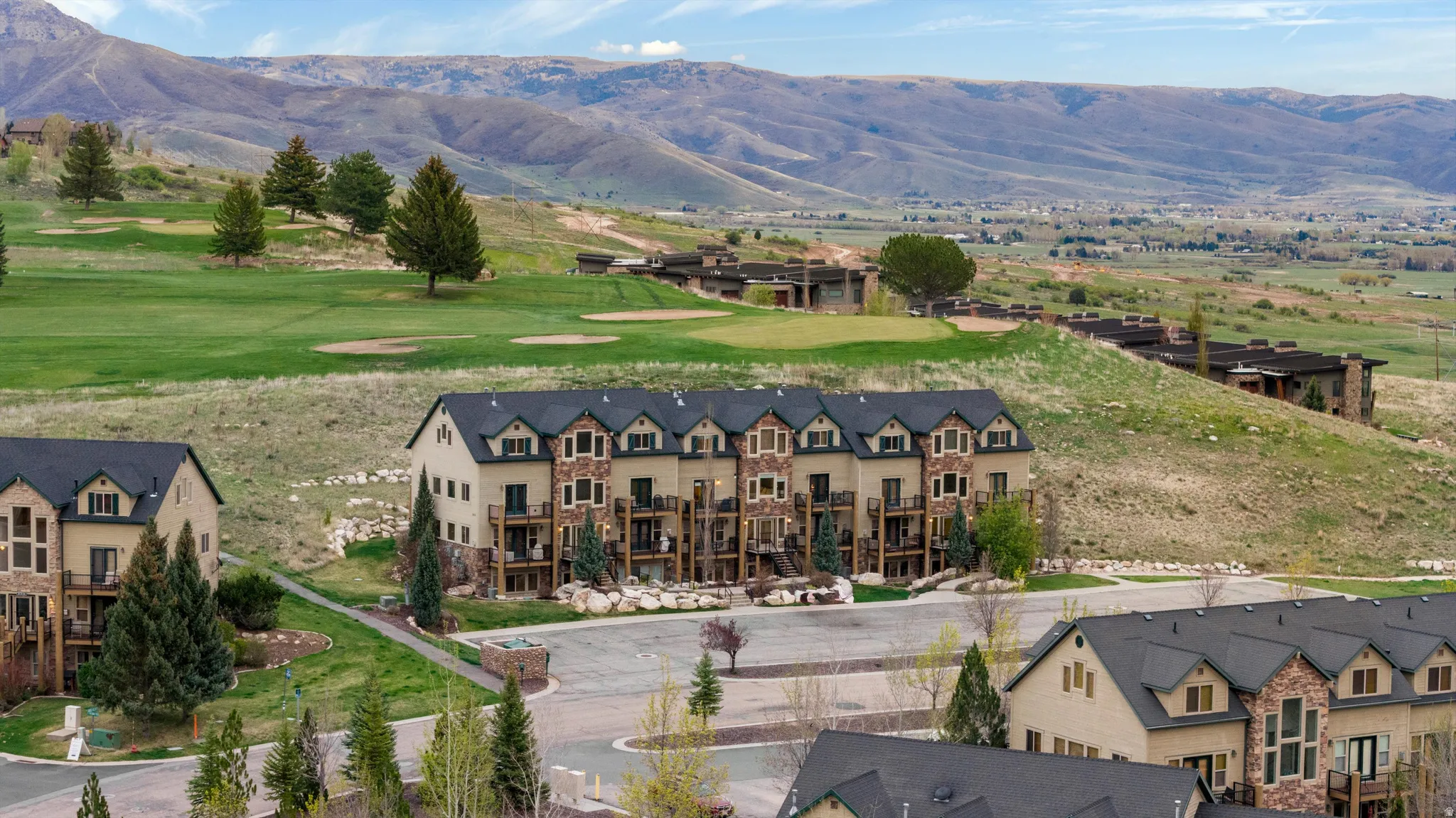 View of mountain backdrop with a golf club