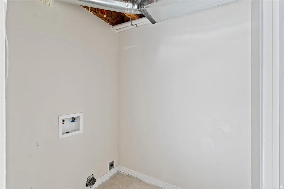 2nd Laundry room featuring washer hookup and electric dryer hookup