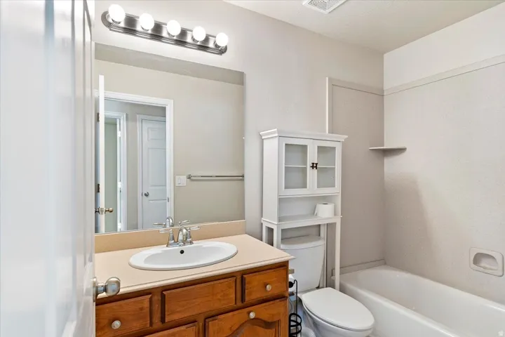 Full bathroom with vanity and shower / bathtub combination
