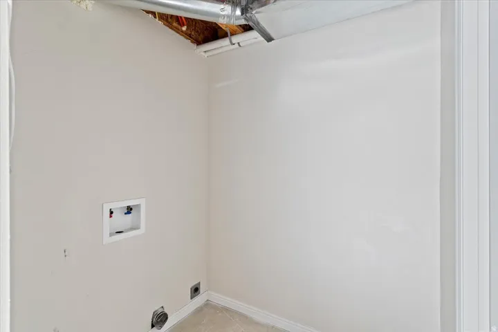 2nd Laundry room featuring washer hookup and electric dryer hookup