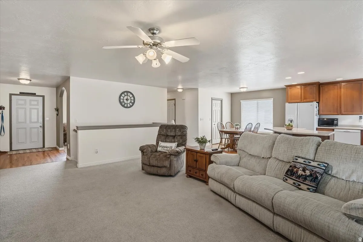 Family room with kitchen in background