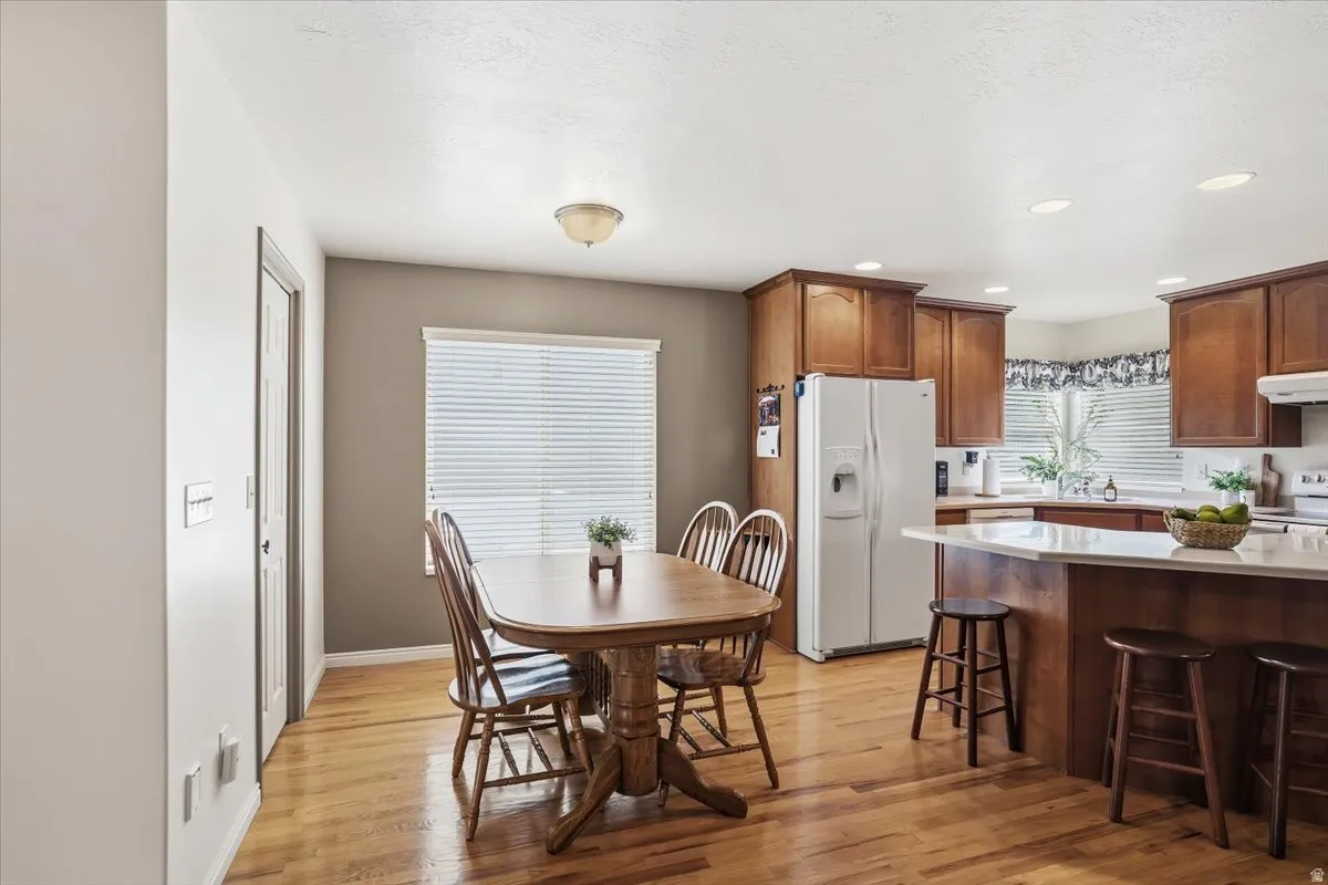 Dining area with hardwood floors