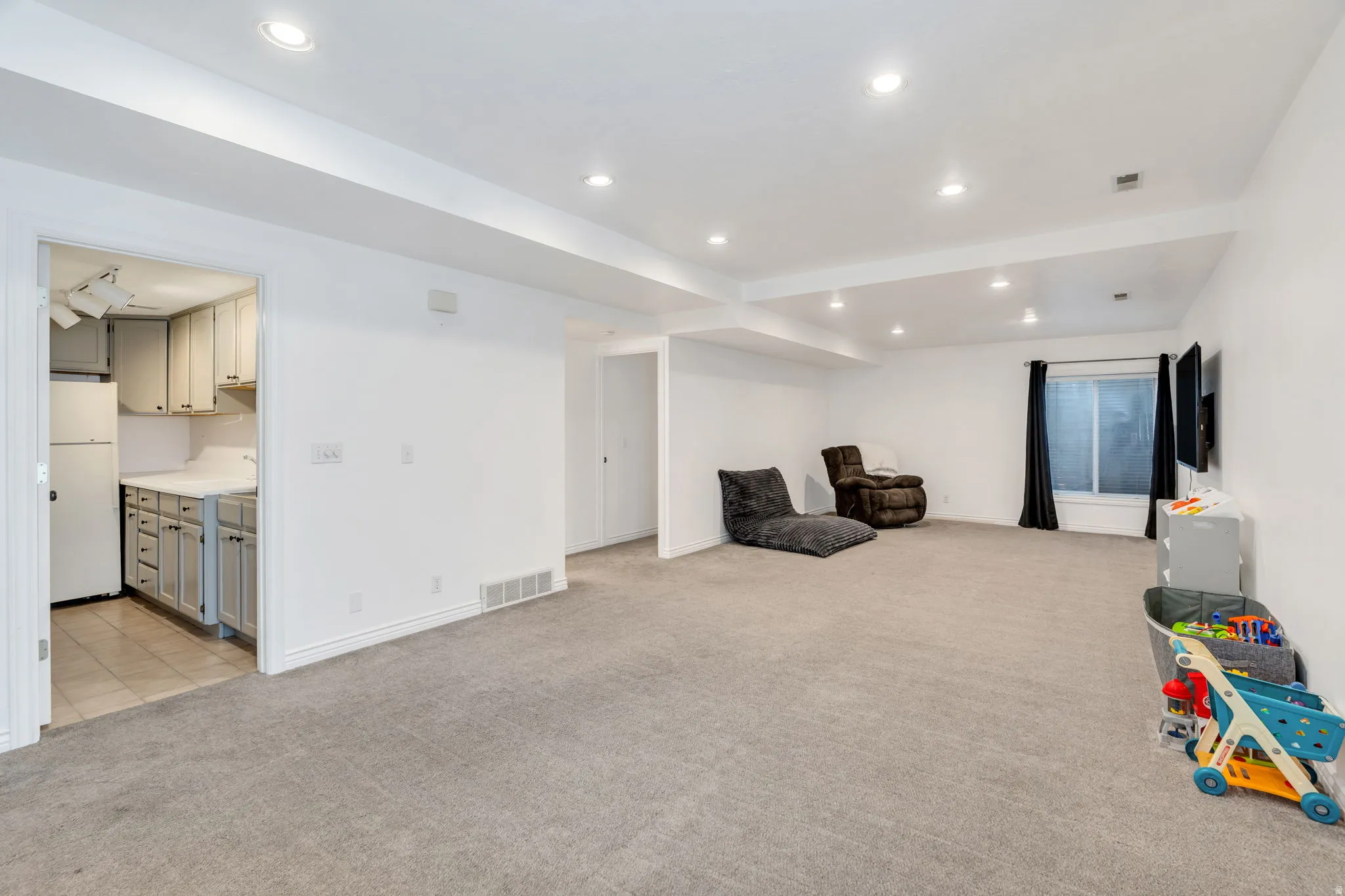 Playroom featuring recessed lighting and light colored carpet