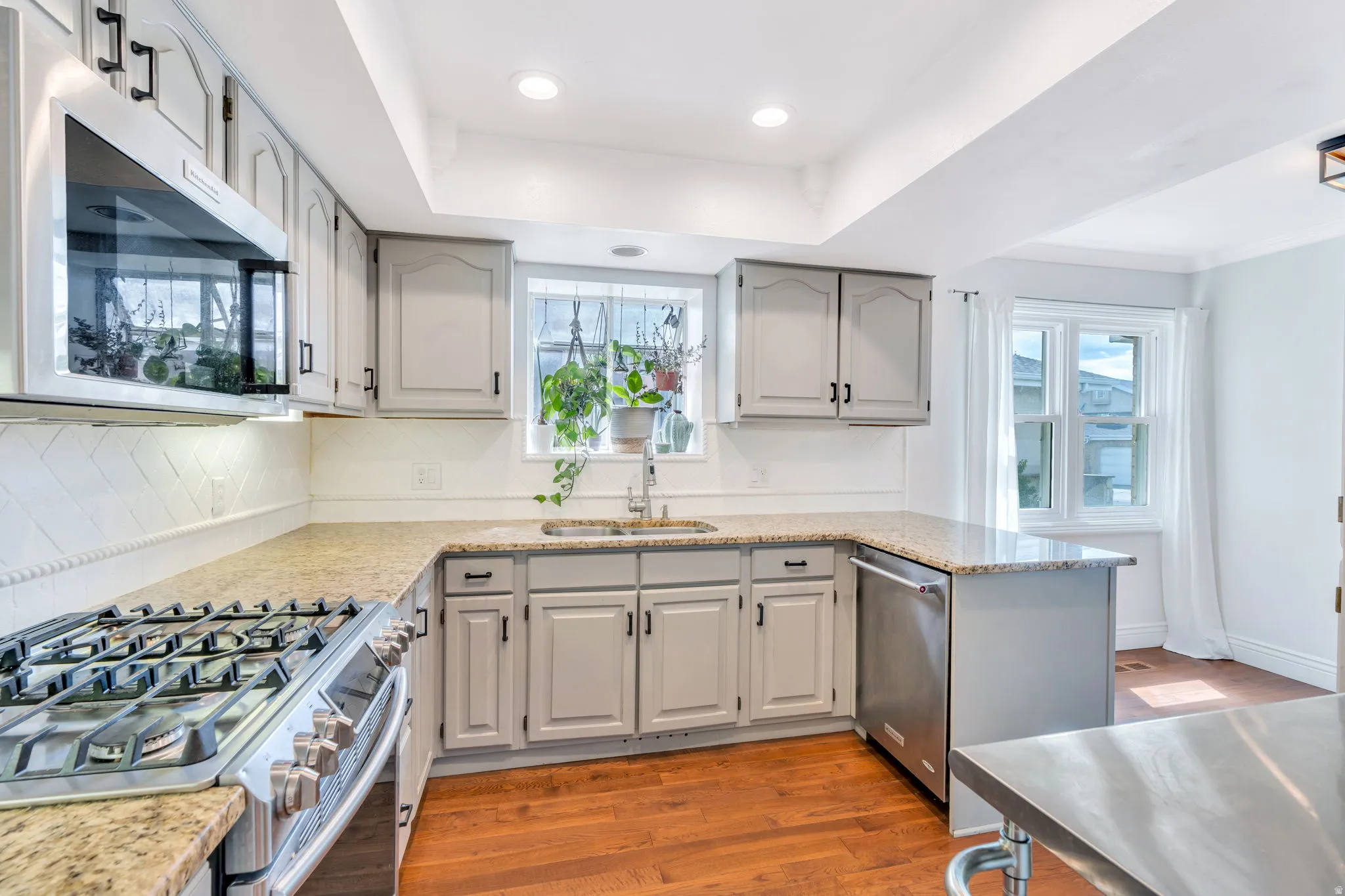 Beautiful gray cabinets and gas range