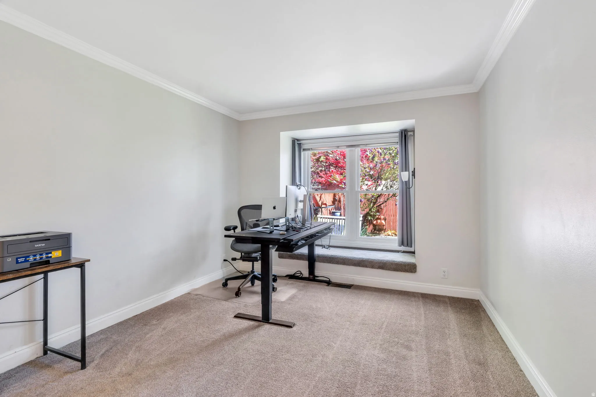 Main floor master is currently being used as a home office