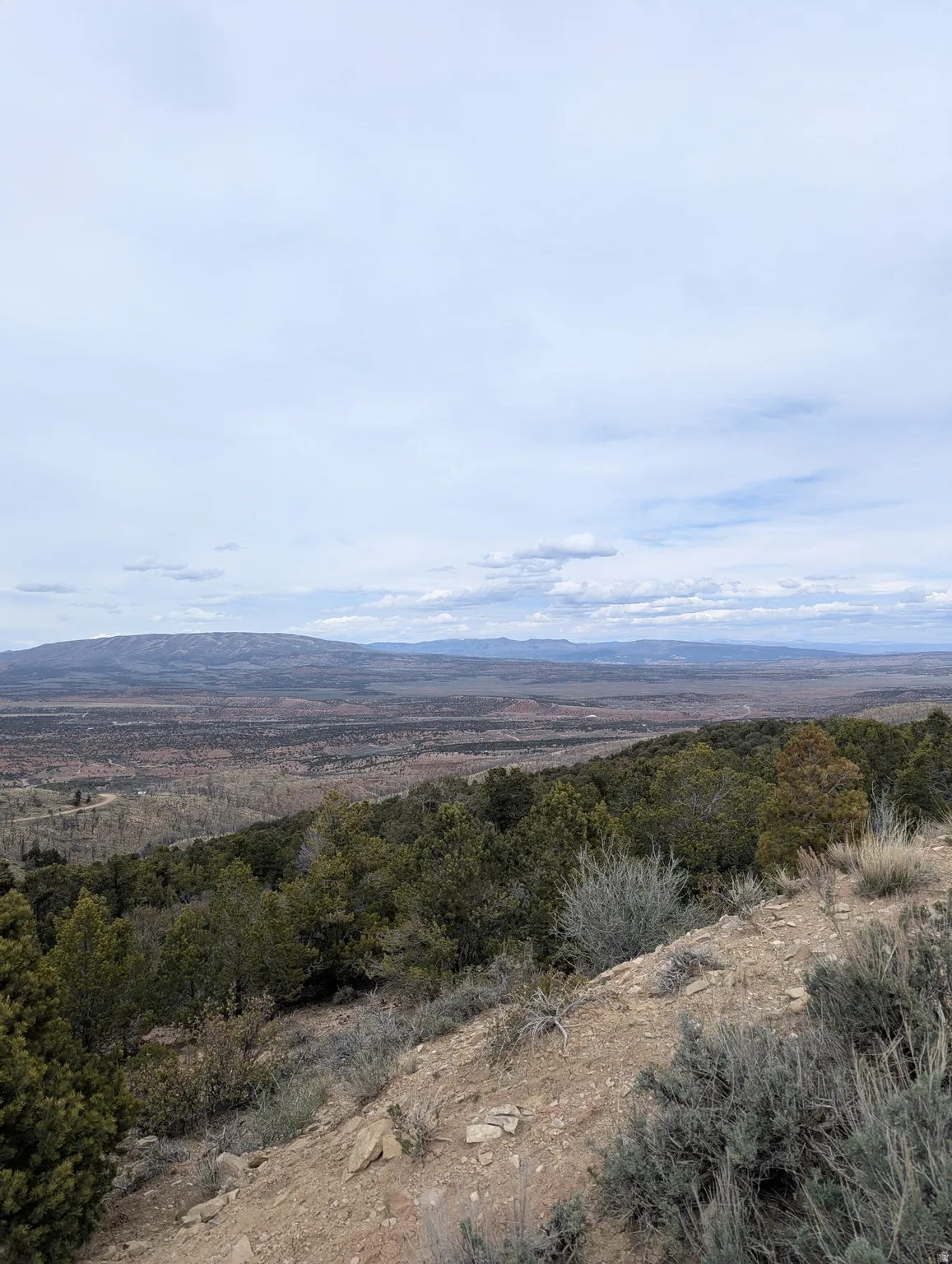 View looking North at Tabby Mountain and Uintahs.