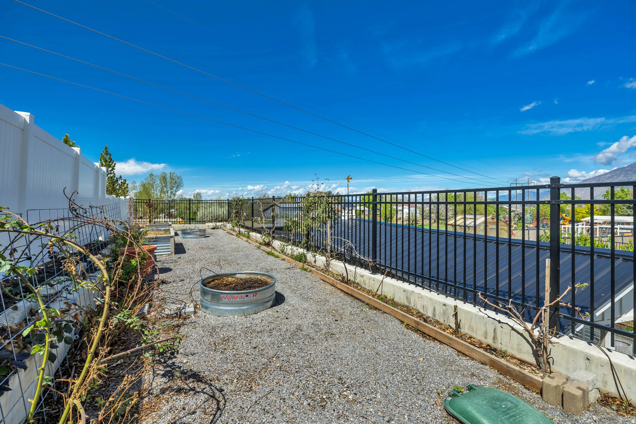 View of fenced backyard