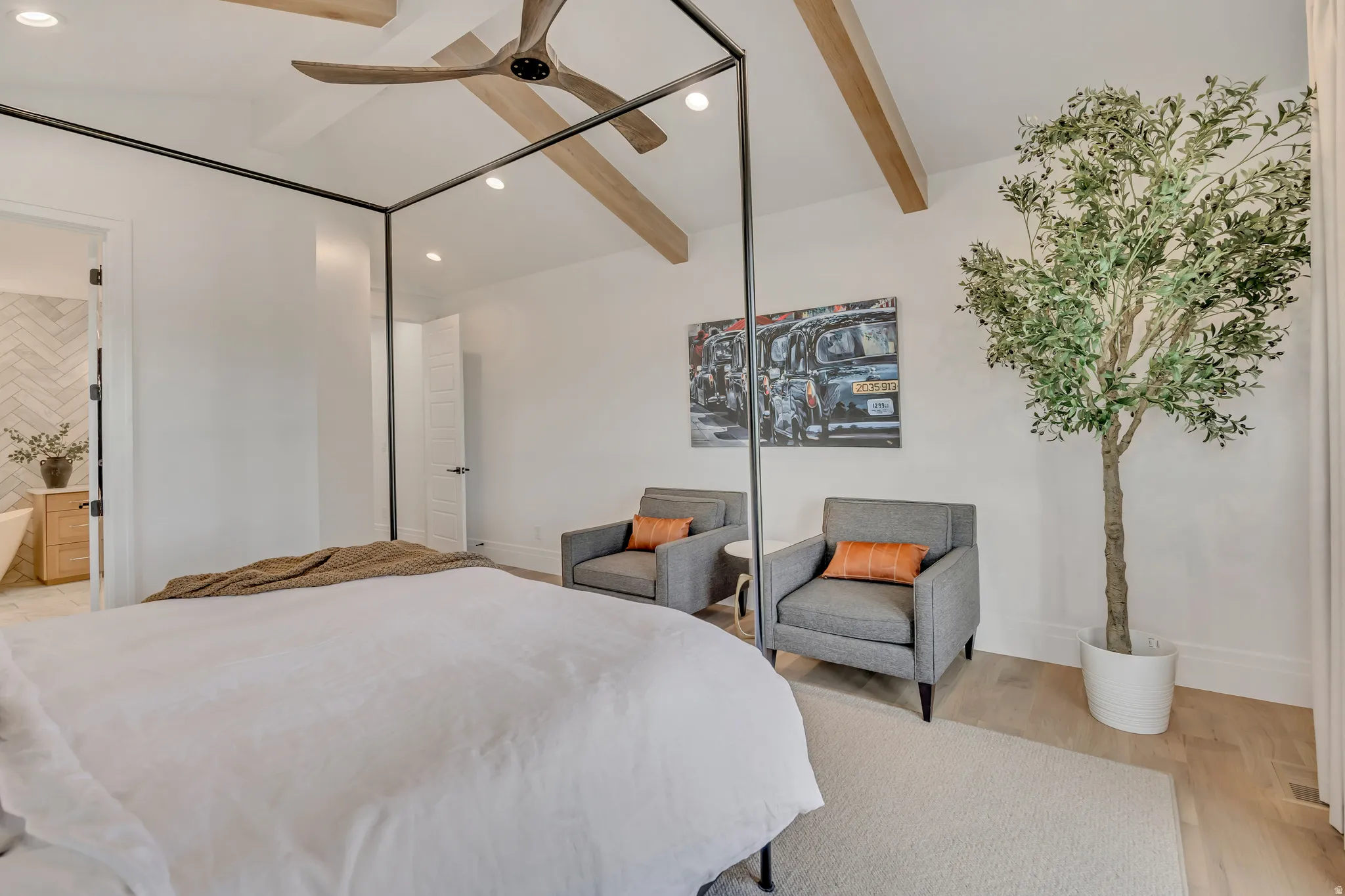 Bedroom with recessed lighting, light wood-style flooring, lofted ceiling with beams, and a ceiling fan
