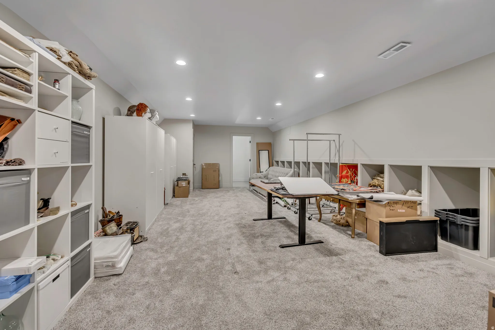 Game room with light carpet and recessed lighting