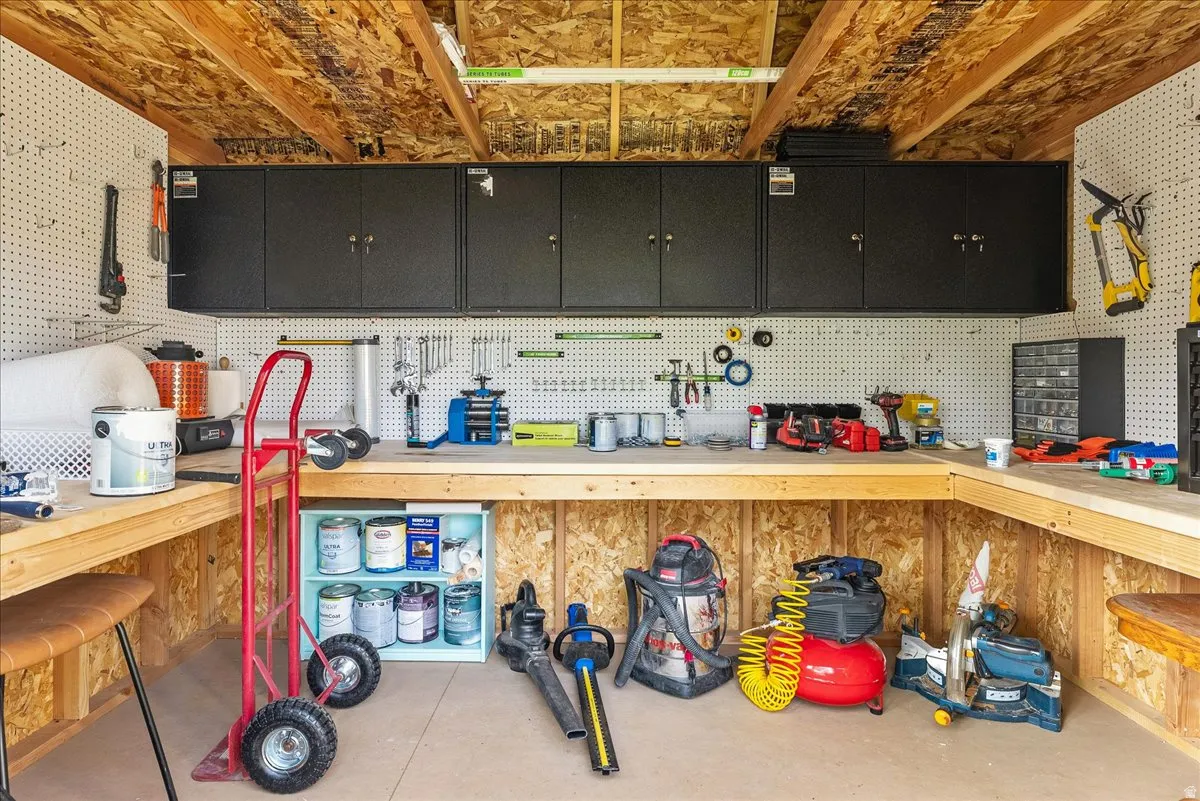 Garage featuring a workshop area