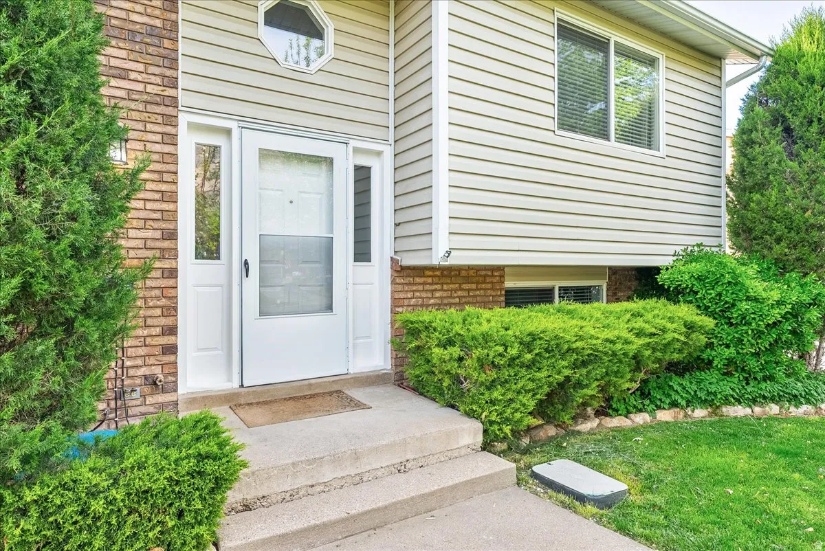 Property entrance with brick siding