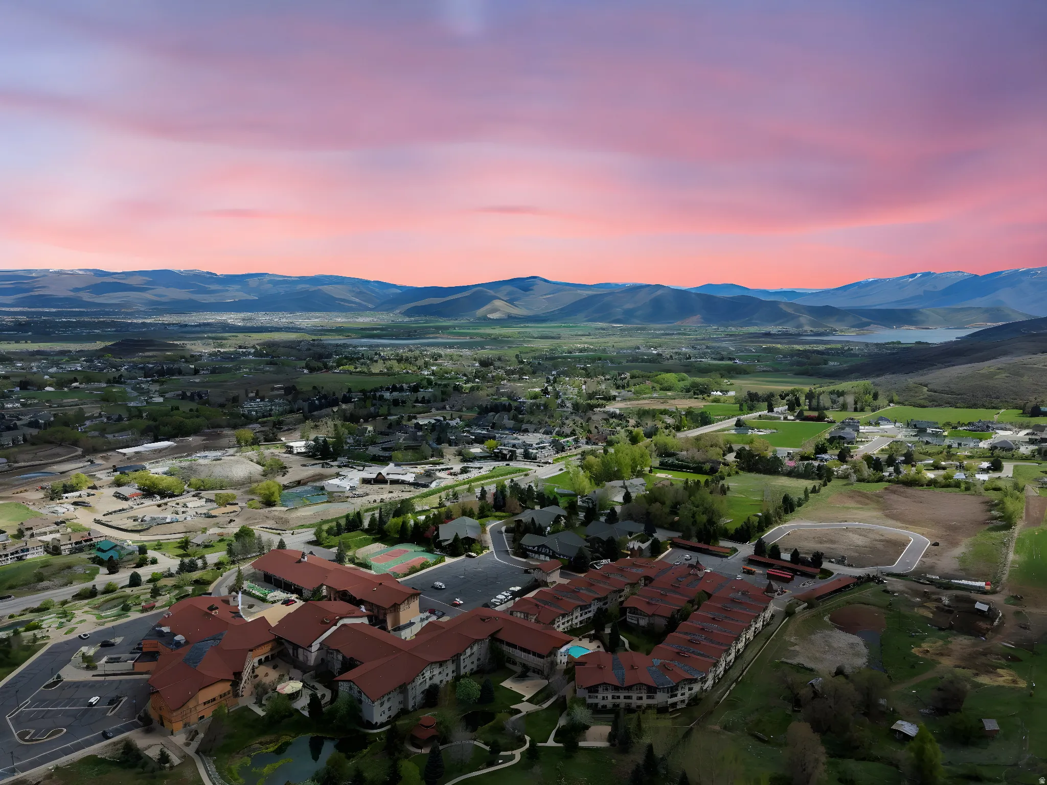 Aerial view at dusk of a mountain view and a residential view