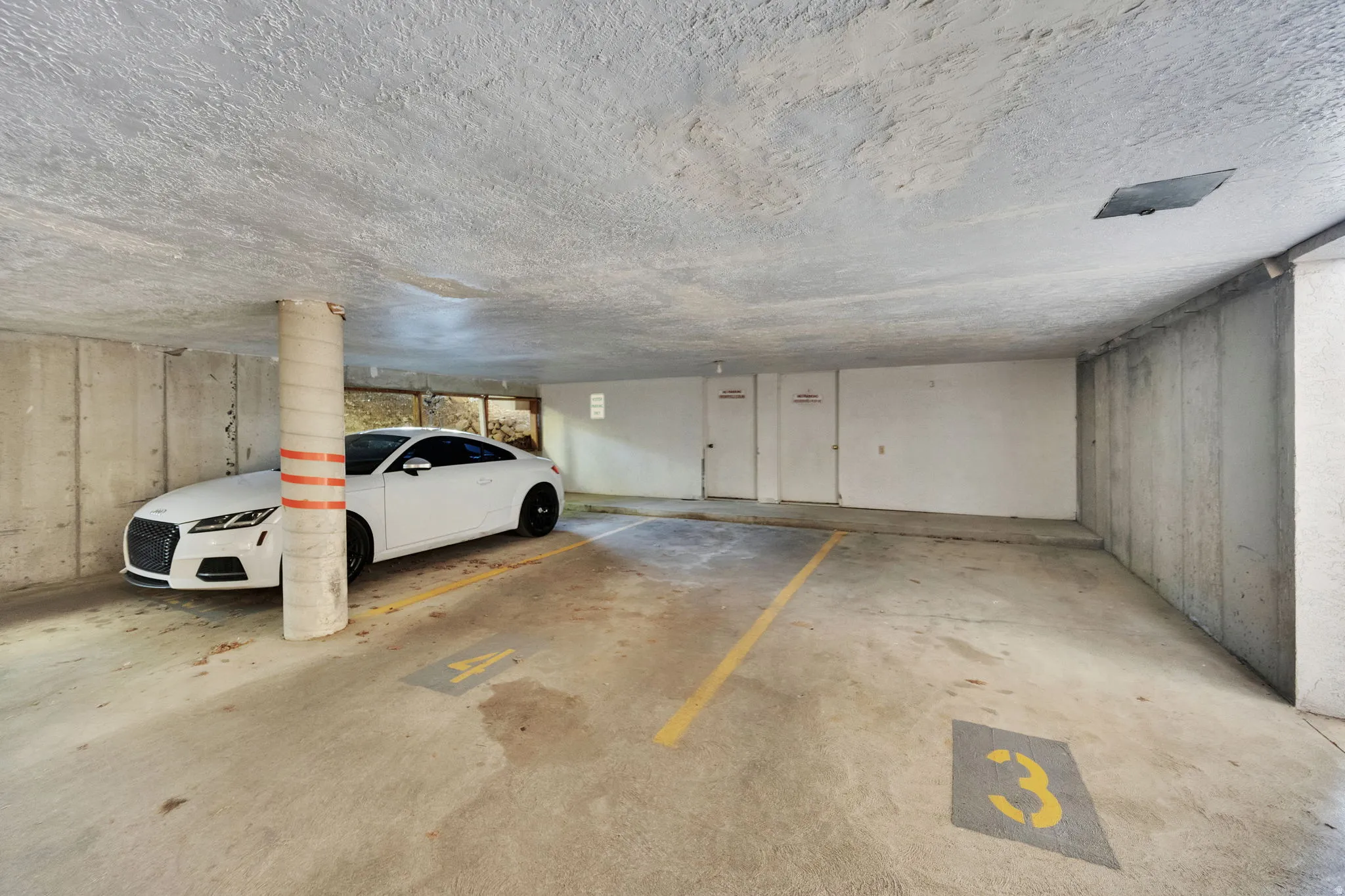 Garage with a parking garage and storage room #4