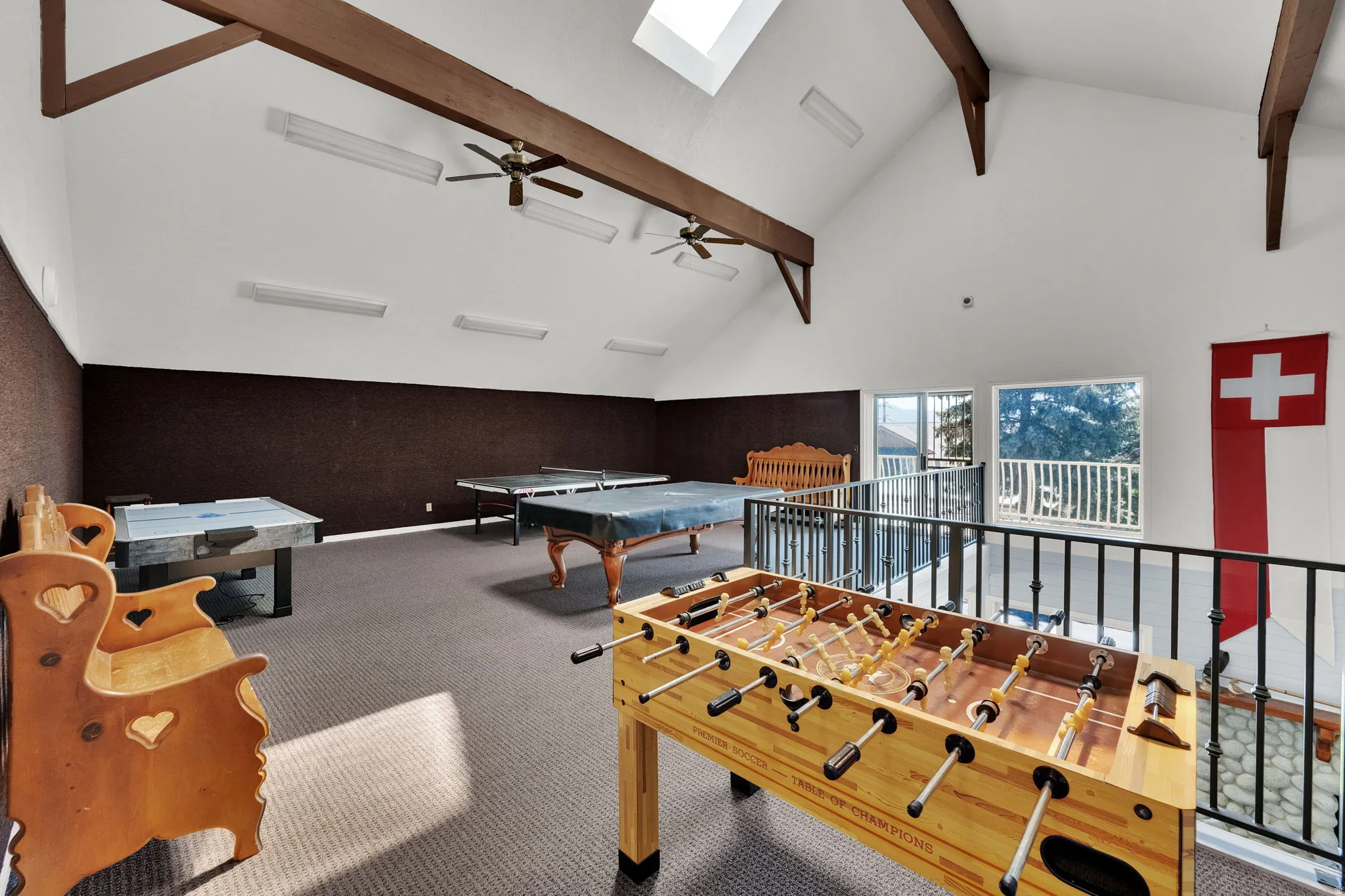 Game room featuring billiards, a ceiling fan, and a skylight
