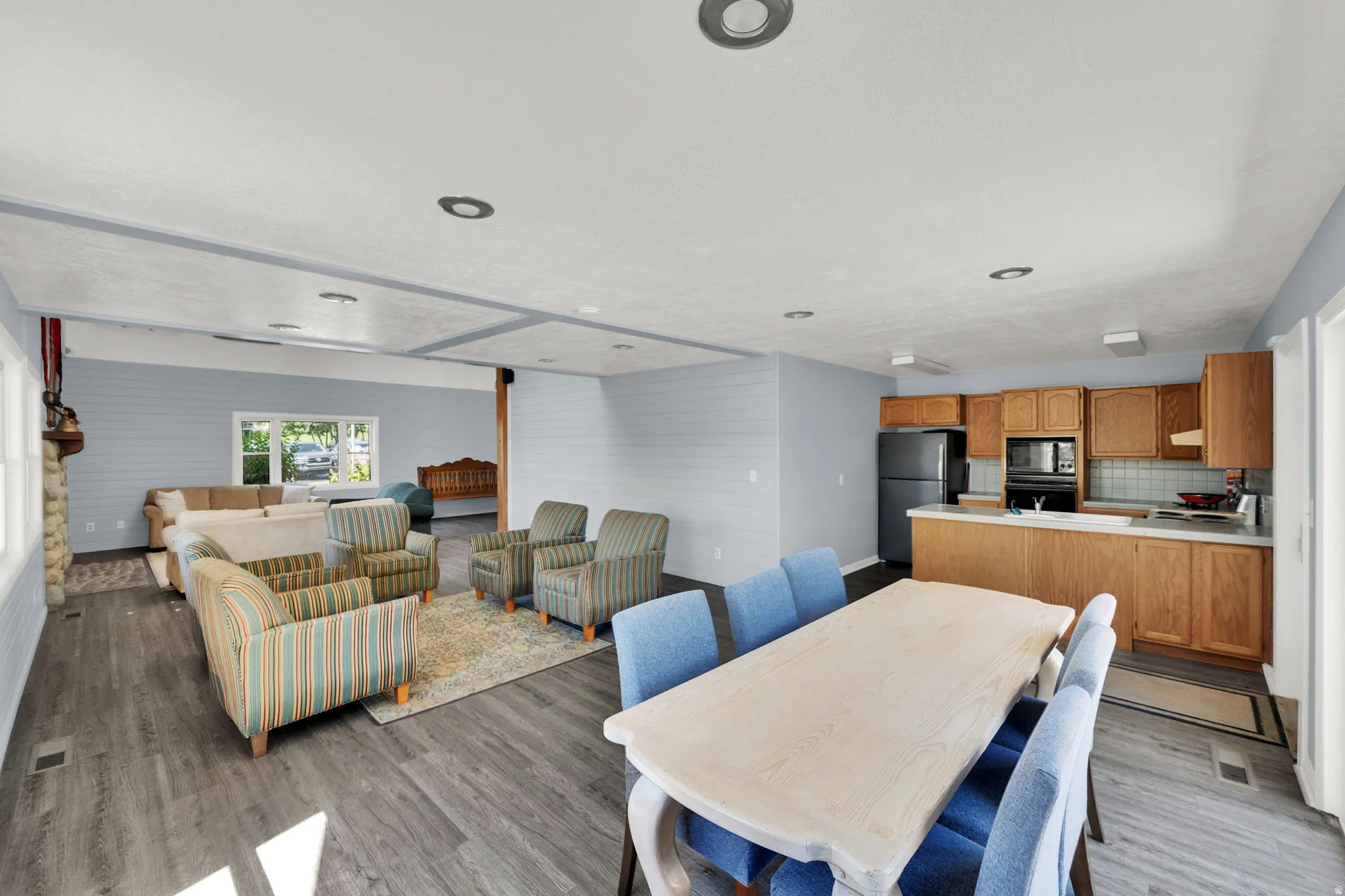 Dining area with light wood-style flooring