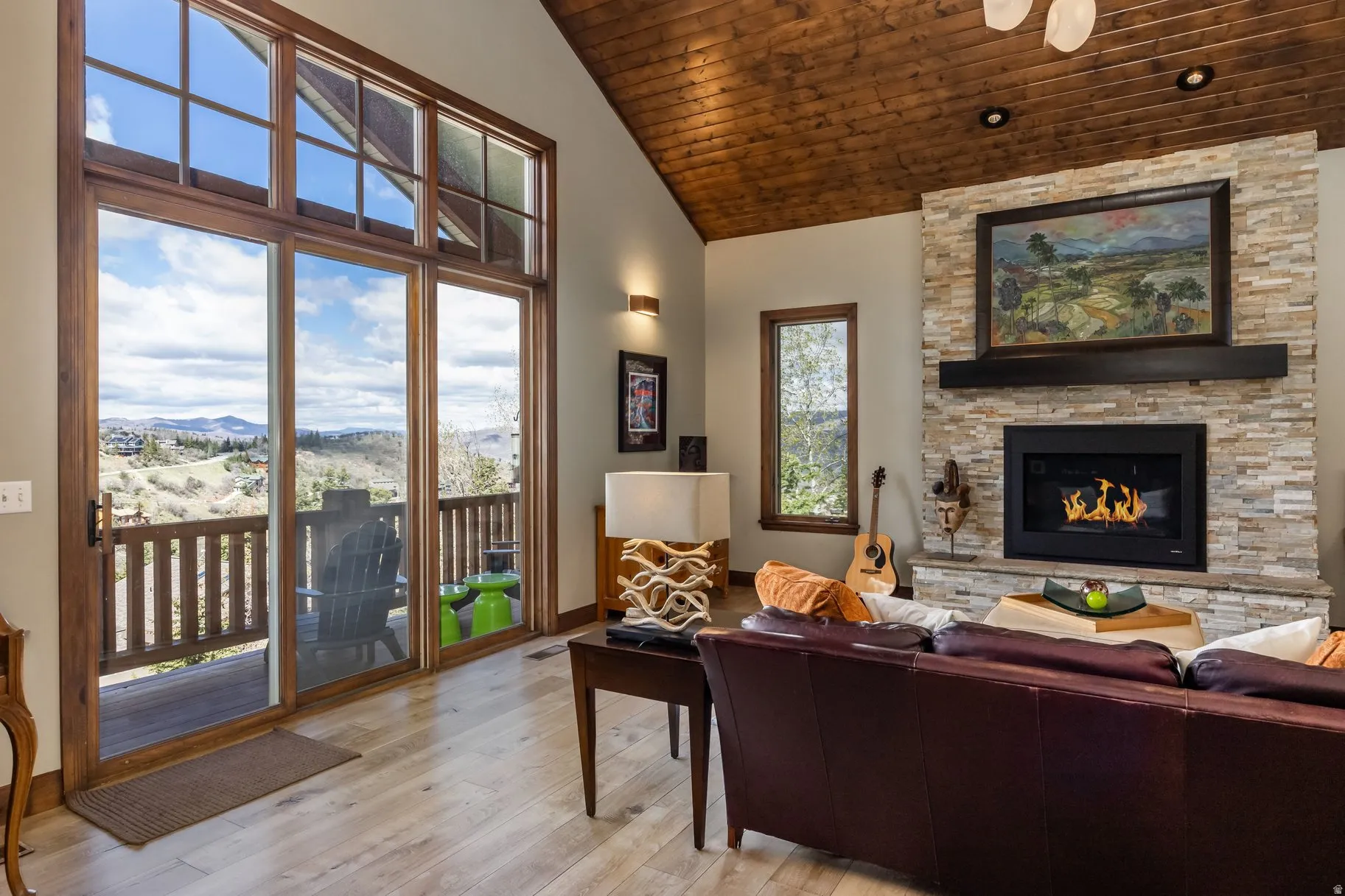 Vaulted ceiling featuring wood-finish paneling