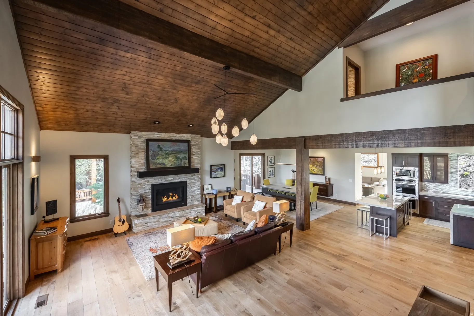 Vaulted wood-paneled ceiling with exposed beams