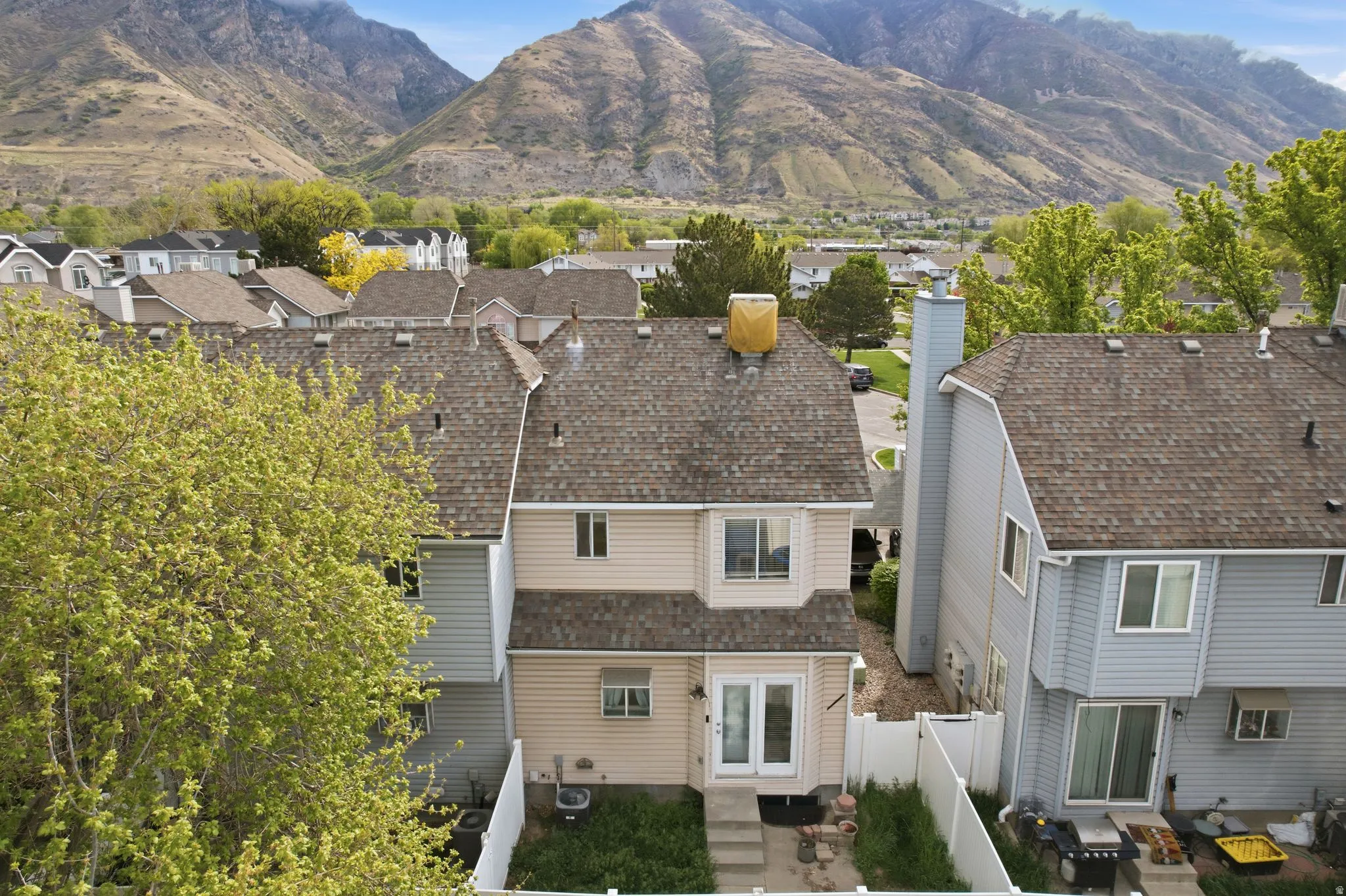 View of mountain backdrop with nearby suburban area