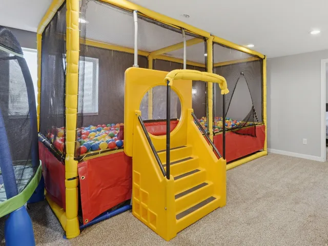 Custom built BALL PIT in basement entertainment area.
